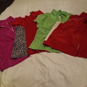 Golf skort, 3 shirts and vest.